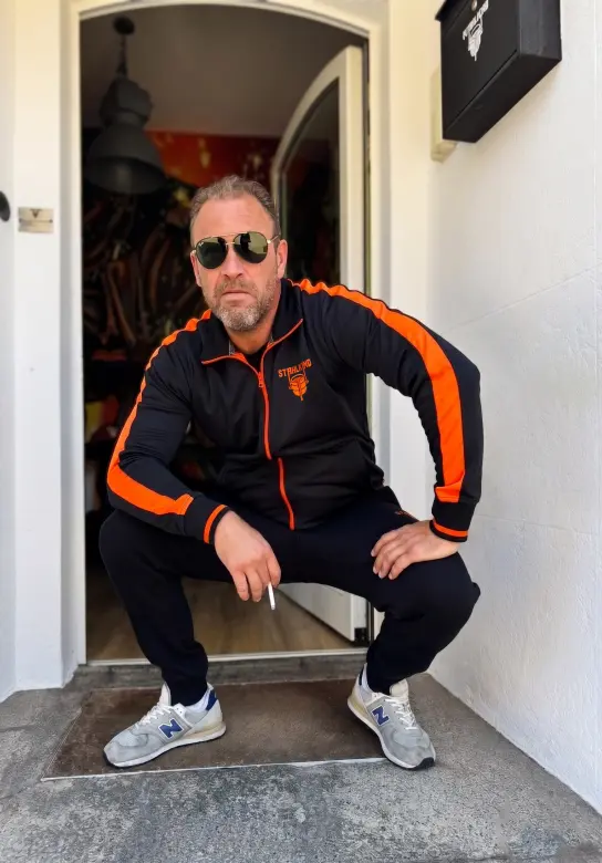 Trainingsanzug schwarz/orange